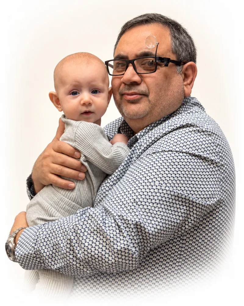 Vagarshak “George” Agasiev holding his grandson Vagarshak, also known as George
