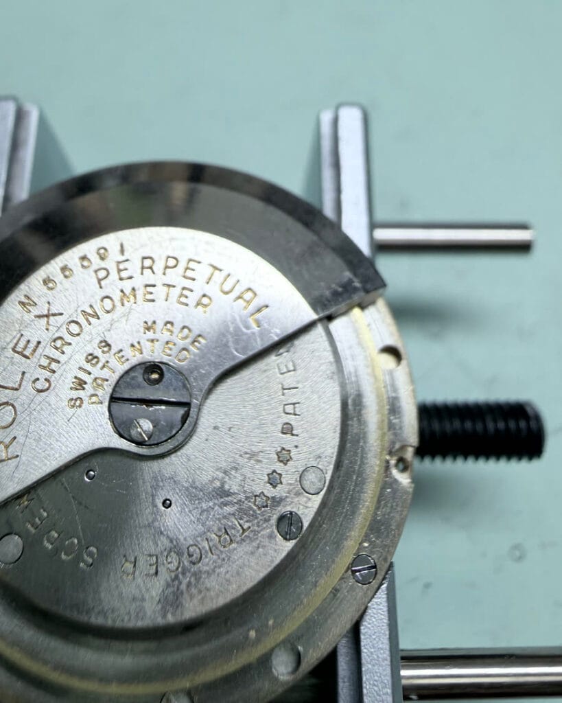 Rolex caseback documented during careful service review.